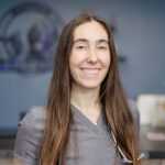 Female Veterinarian with long brown straight hair